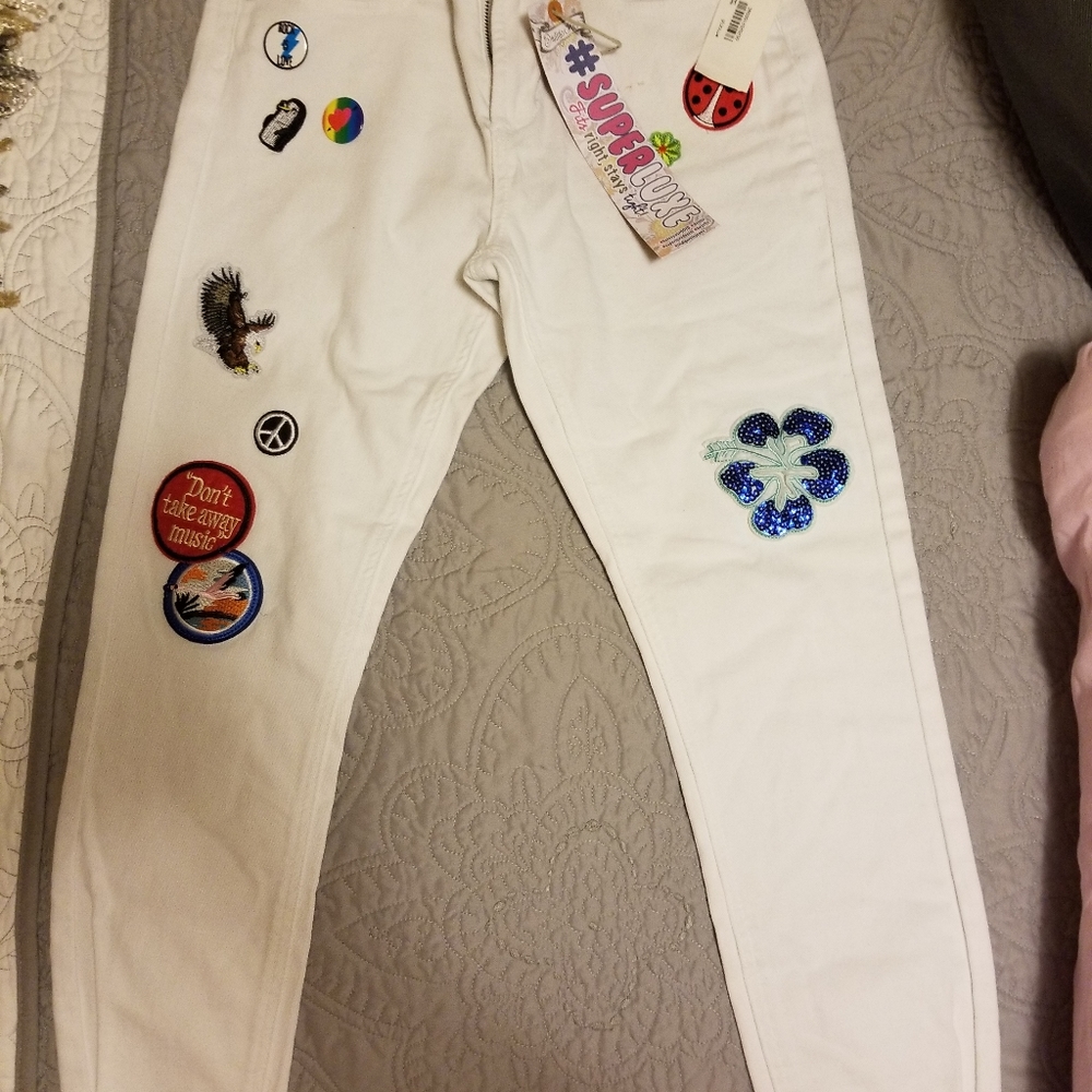 White multi patch 5 pocket jeans